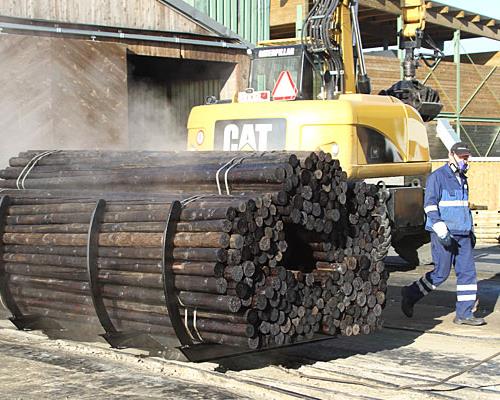 Een omheining in keteldruk geïmpregneerd hout: stevigheid plus schoonheid