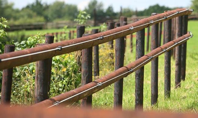 Electrify a wooden fence